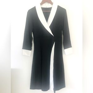 Elegant new dress, size medium.  Predominantly black with white.